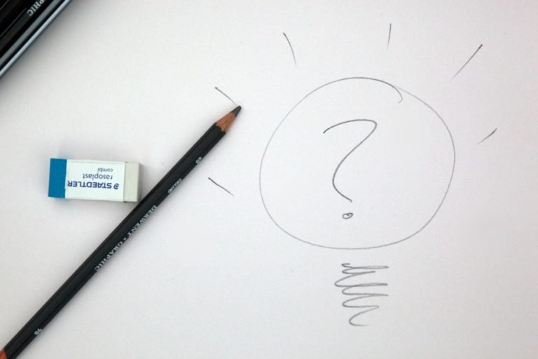 drawn light bulb and a pencil